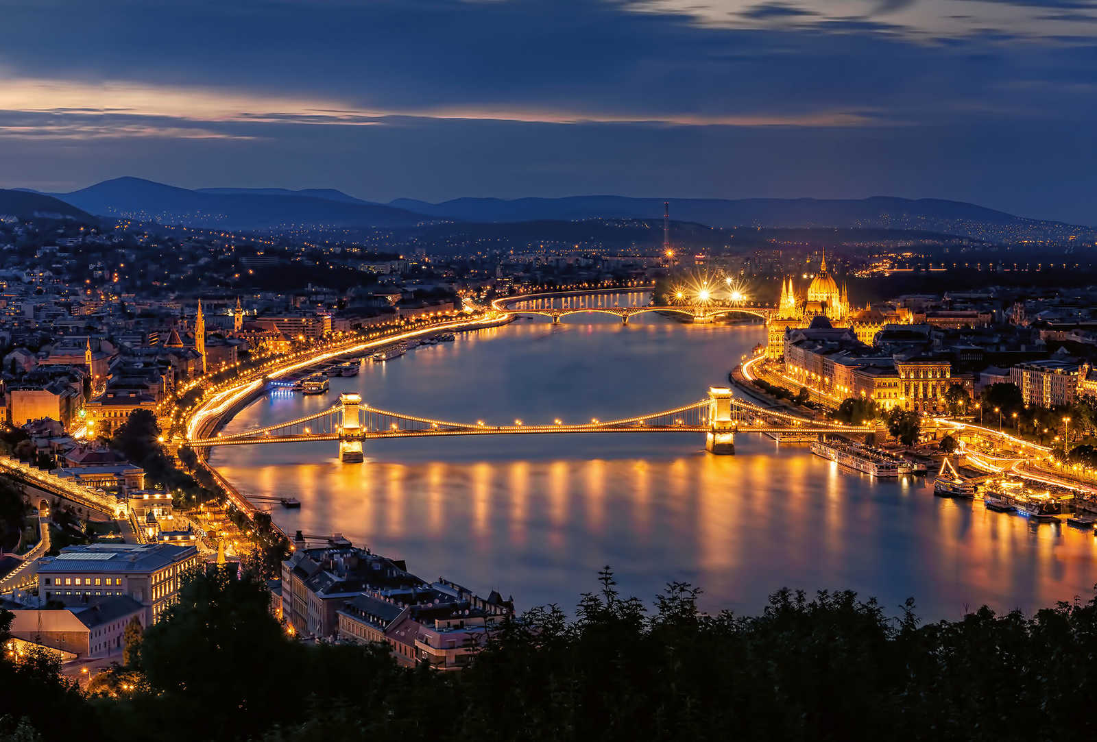 Budapest evening panorama with the Danube, Chain Bridge and illuminated Parliament
