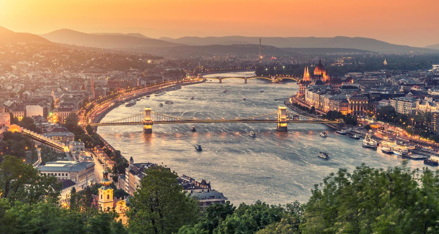 Panoramic view of Budapest at sunset with the Chain Bridge and the Parliament